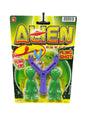 Toy fling shot with green figures on a colorful package labeled 'Alien Force' 